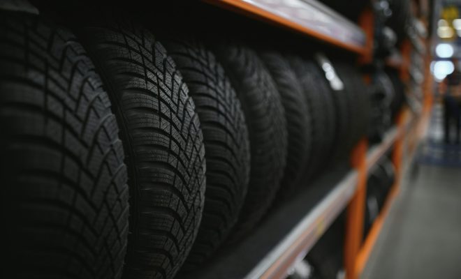 Car tires at warehouse in tire store